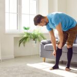 man wearing compression stockings for varicose veins in Bel Air MD