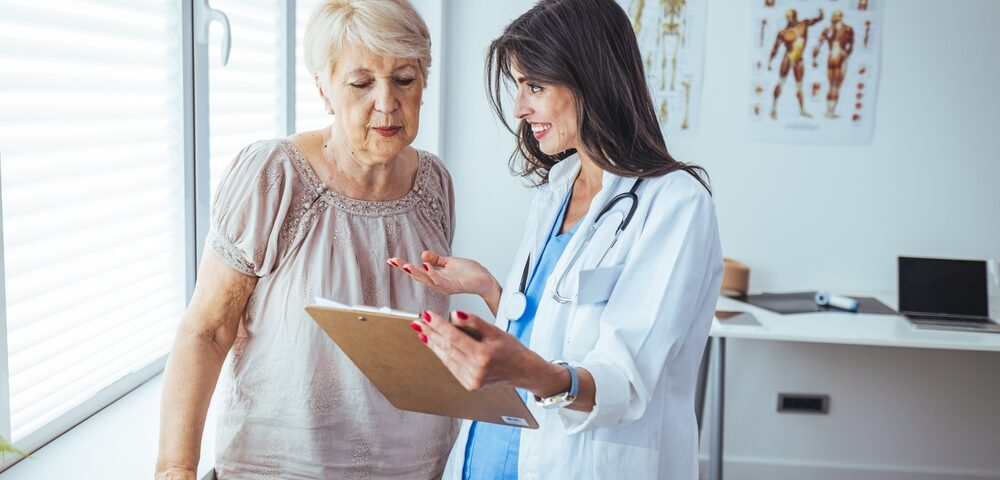 woman reviewing options for outpatient varicose vein removal in Maryland