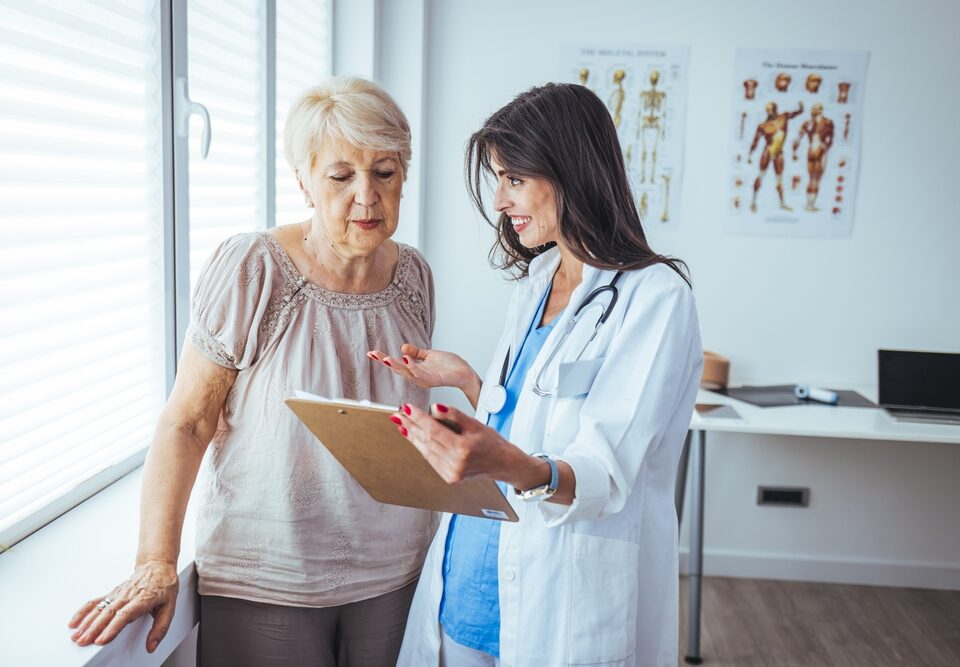 woman reviewing options for outpatient varicose vein removal in Maryland