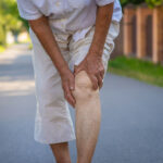 man dealing with burning legs in Maryland from varicose veins