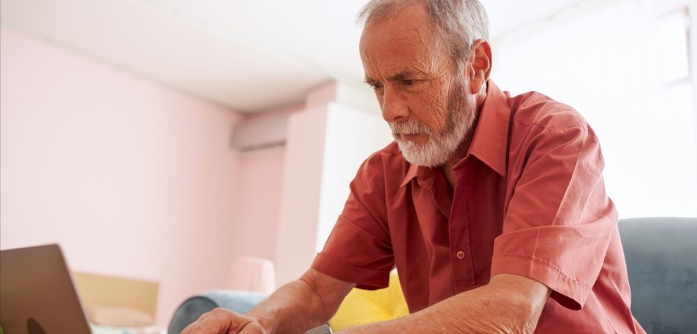 man researching if insurance will pay for varicose vein treatment in Maryland