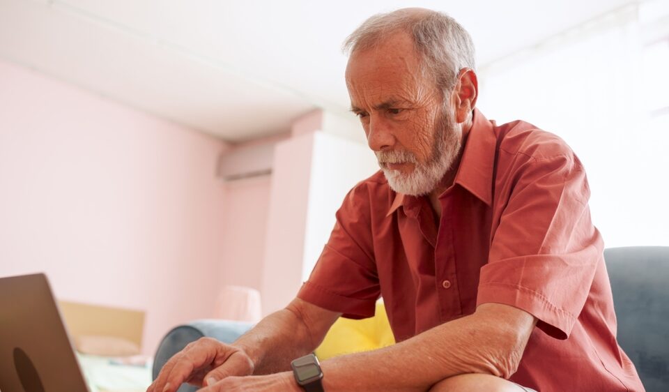 man researching if insurance will pay for varicose vein treatment in Maryland