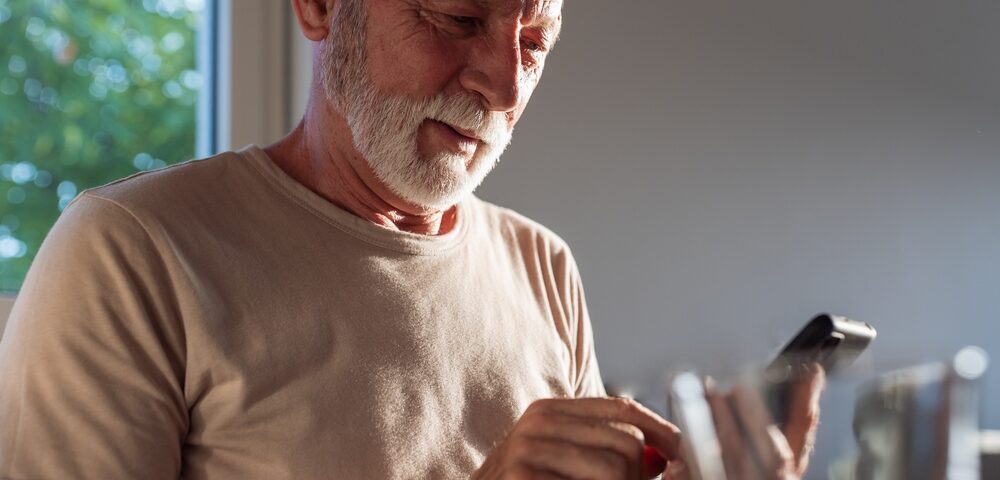 man researching varicose vein treatment cost in Maryland