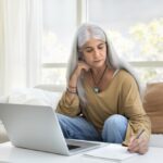 woman looking up the cost of varicose vein treatments in Bel Air MD