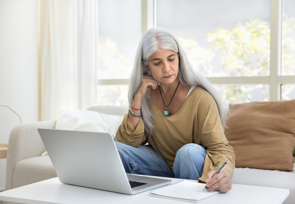 woman looking up the cost of varicose vein treatments in Bel Air MD