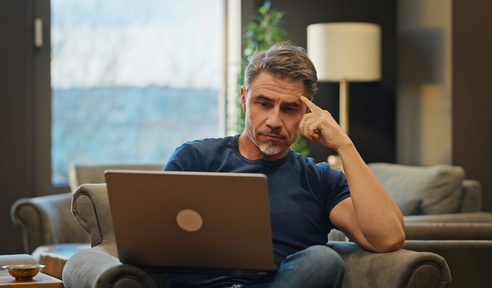 man deciding between spider veins and varicose veins