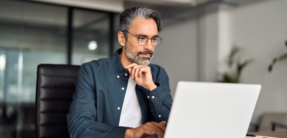 man looking up the cost of varicose vein treatments in Maryland