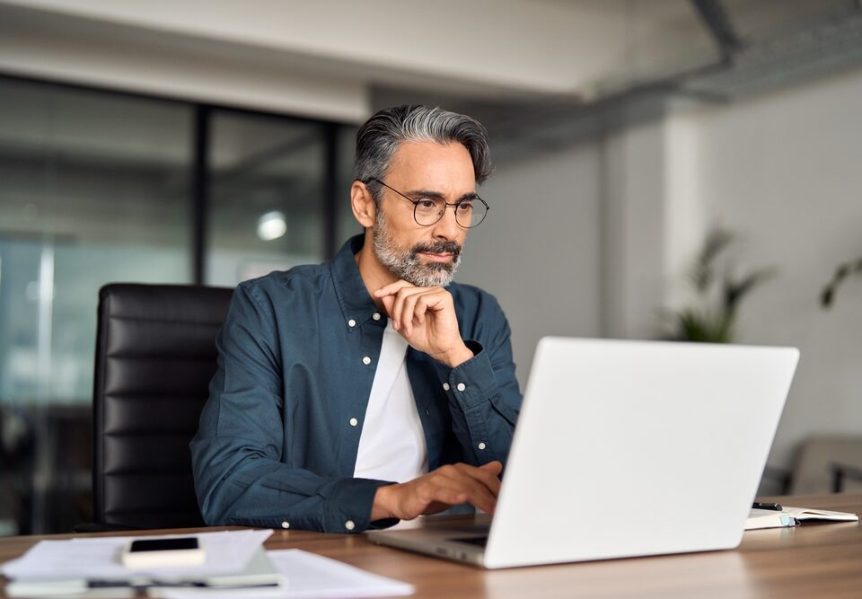 man looking up the cost of varicose vein treatments in Maryland