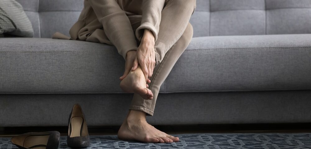 legs feel heavy for woman at the end of the day